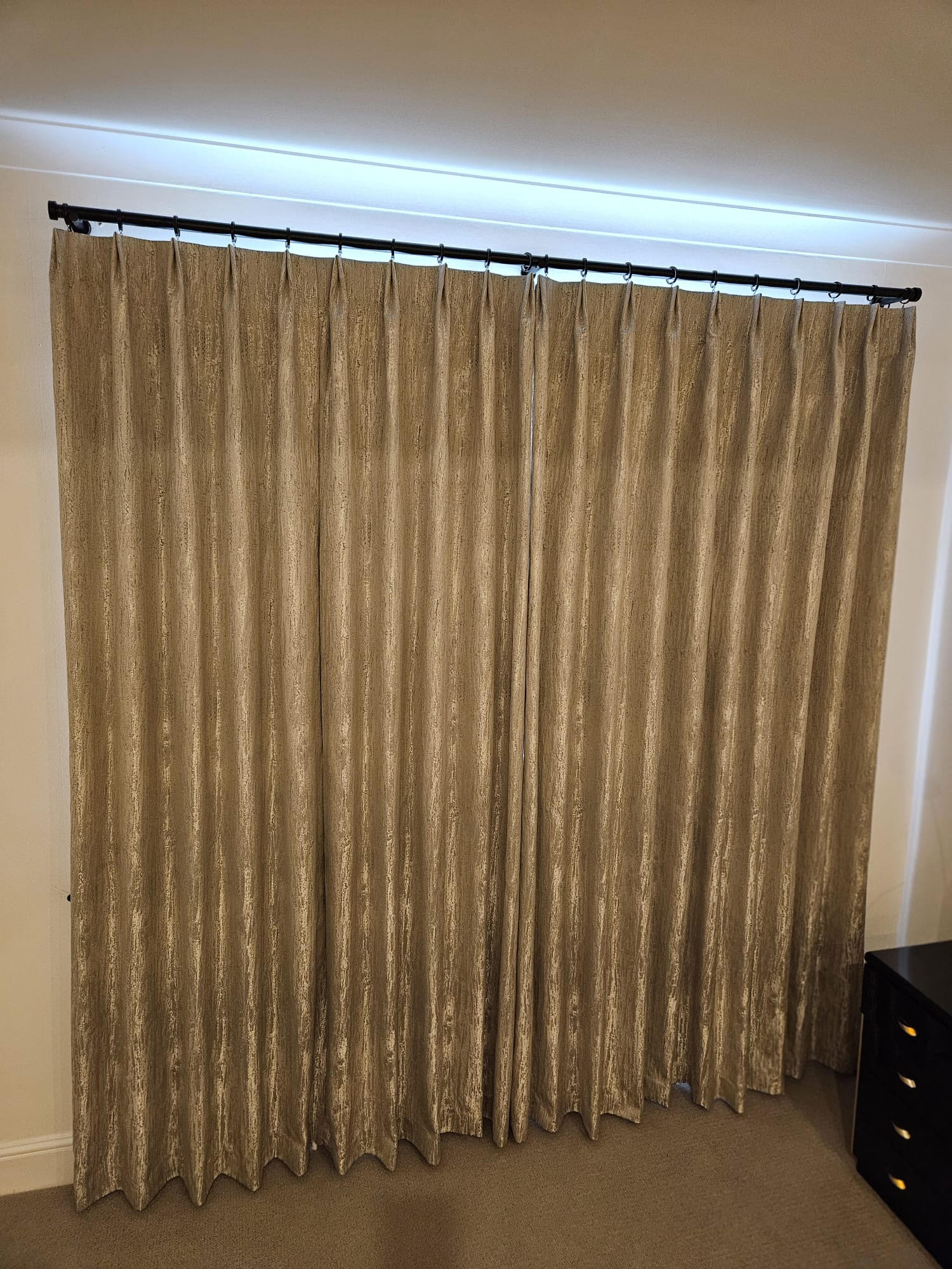 twin pleat europleat curtains hanging from a pole East London